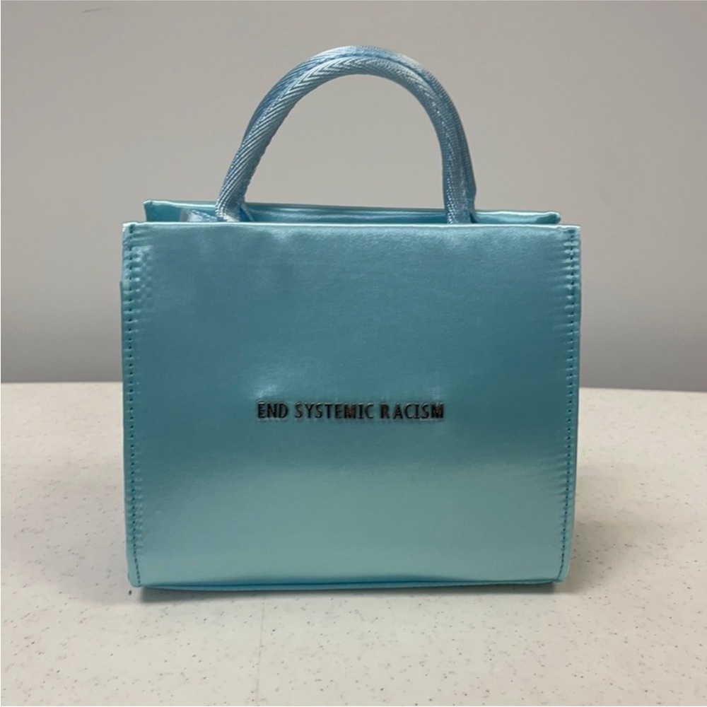 Brandon Blackwood End Systemic Racism satin baby blue bag